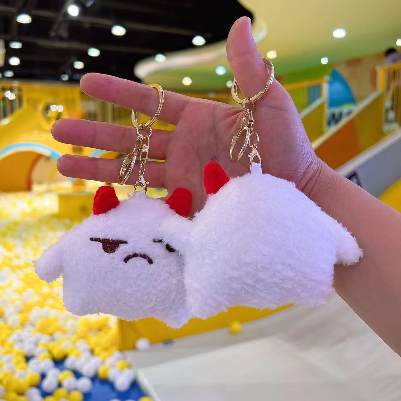 Porte-clés de poupée de veau o - Kids Quirky Toys avis et prix